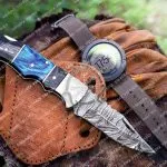 Damascus Folding Pocket Knife — Hand-Forged, 6.5″ Overall, Pakka Wood Handle, Leather Sheath