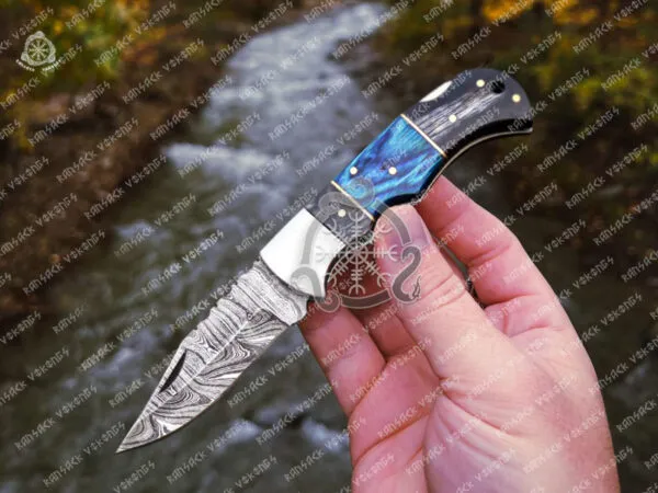Damascus Folding Pocket Knife — Hand-Forged, 6.5″ Overall, Pakka Wood Handle, Leather Sheath - view 2