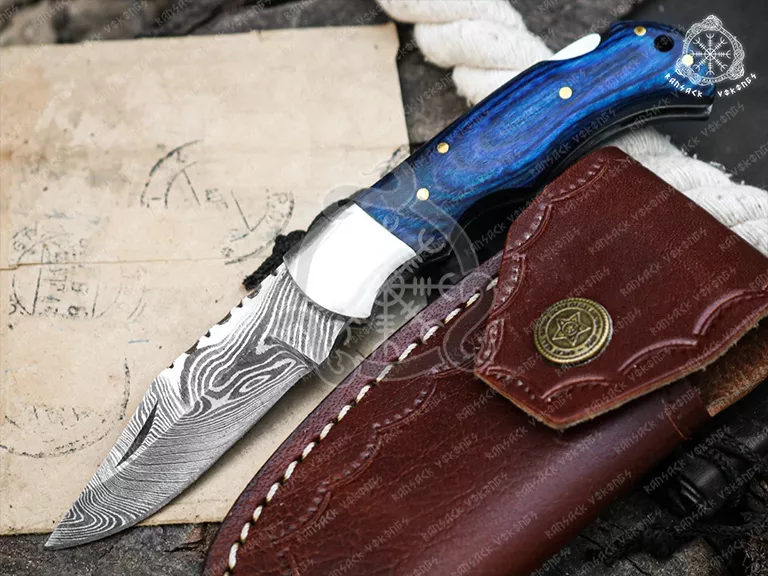 Damascus Folding Pocket Knife — Hand-Forged, 6.5″ Overall, Hardwood Handle, Leather Sheath