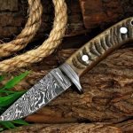 Damascus Skinner Knife — Hand-Forged, Ram Horn Handle, Leather Sheath