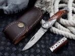Damascus Folding Pocket Knife — Hand-Forged, 7" Overall, Wood Handle, Leather Sheath | Engraving Available