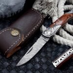 Damascus Folding Pocket Knife — Hand-Forged, 7" Overall, Wood Handle, Leather Sheath | Engraving Available