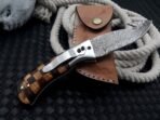 Damascus Folding Pocket Knife — Hand-Forged, 8" Overall, Wood Handle, Leather Sheath - Image 4