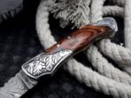Damascus Folding Pocket Knife — Hand-Forged, 7" Overall, Wood Handle, Leather Sheath | Engraving Available - Image 3