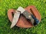 Damascus Folding Pocket Knife — Hand-Forged, 7.5" Overall, Resin Handle, Leather Sheath