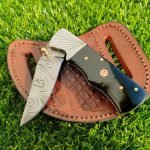 Damascus Folding Pocket Knife — Hand-Forged, 7.5" Overall, Resin Handle, Leather Sheath