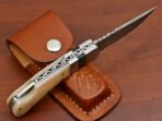 Damascus Folding Pocket Knife — Hand-Forged, 7" Overall, Bone Handle, Leather Sheath - Image 4