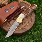 Damascus Folding Pocket Knife — Hand-Forged, 7" Overall, Stag Horn Handle, Leather Sheath