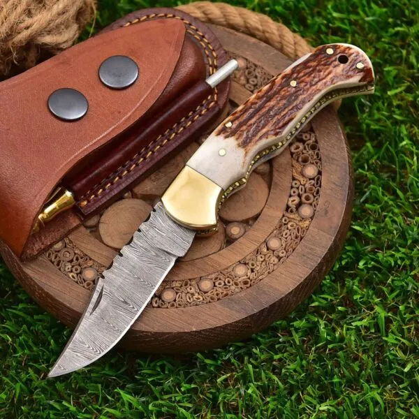 Damascus Folding Pocket Knife — Hand-Forged, 7″ Overall, Stag Horn Handle, Leather Sheath