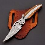 Damascus Folding Pocket Knife — Hand-Forged, 8" Overall, Wood Handle, Leather Sheath (RK-446)