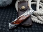 Damascus Folding Pocket Knife — Hand-Forged, 7" Overall, Wood Handle, Leather Sheath | Engraving Available - Image 7