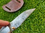 Damascus Folding Pocket Knife — Hand-Forged, 7.5" Overall, Resin Handle, Leather Sheath - Image 7