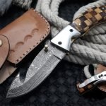 Damascus Folding Pocket Knife — Hand-Forged, 8" Overall, Wood Handle, Leather Sheath