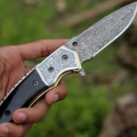 Damascus Folding Pocket Knife — Hand-Forged, 9" Overall, Camel Bone Handle, Leather Sheath | Engraving Available