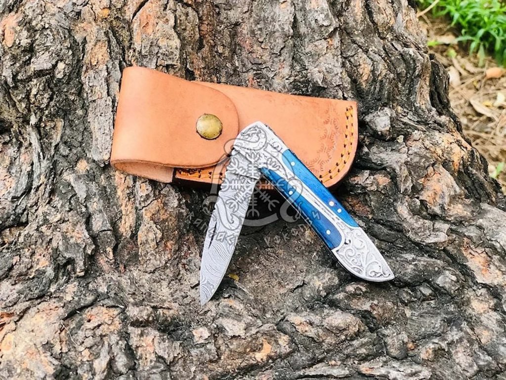 Damascus Folding Pocket Knife — Hand-Forged, 8″ Overall, Pakka Wood Handle, Leather Sheath