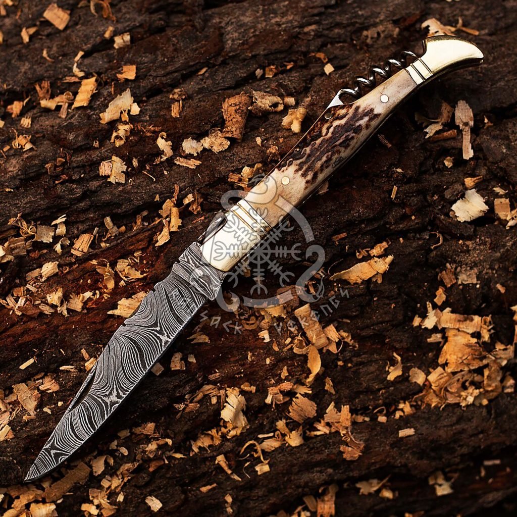 Damascus Folding Pocket Knife — Hand-Forged, Stag Horn Handle, Leather Sheath