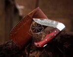 Damascus Folding Pocket Knife — Hand-Forged, 7" Overall, Hardwood Handle, Leather Sheath | Engraving Available