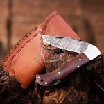 Damascus Folding Pocket Knife — Hand-Forged, 7" Overall, Wood Handle, Leather Sheath | Engraving Available (RK-560)