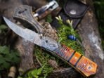 Damascus Folding Pocket Knife — Hand-Forged, 7.5" Overall, Leather Sheath - Image 3