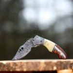 Damascus Folding Pocket Knife — Hand-Forged, 7" Overall, Camel Bone Handle, Leather Sheath