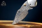 Damascus Folding Pocket Knife — Hand-Forged, 7″ Overall, Camel Bone Handle, Leather Sheath - view 5