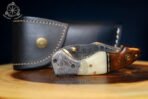 Damascus Folding Pocket Knife — Hand-Forged, 7″ Overall, Camel Bone Handle, Leather Sheath - view 7