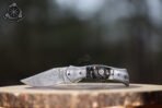 Damascus Folding Pocket Knife — Hand-Forged, 7.5" Overall, Ram Horn Handle, Leather Sheath - Image 3
