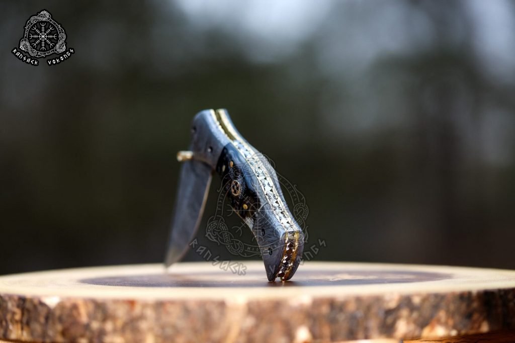 Damascus Folding Pocket Knife — Hand-Forged, 7.5″ Overall, Ram Horn Handle, Leather Sheath - view 2