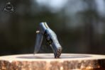 Damascus Folding Pocket Knife — Hand-Forged, 7.5" Overall, Ram Horn Handle, Leather Sheath - Image 2