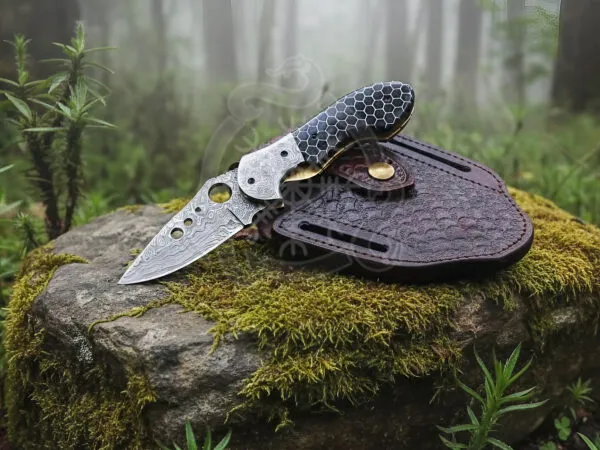 Damascus Folding Pocket Knife — Hand-Forged, Ram Horn Handle, Leather Sheath | Engraving Available