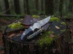 Damascus Folding Pocket Knife — Hand-Forged, Pakka Wood Handle, Leather Sheath