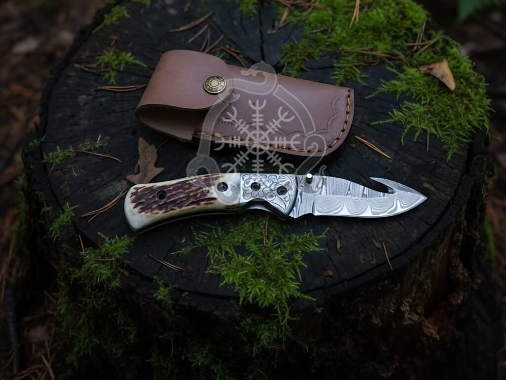 Damascus Folding Pocket Knife — Hand-Forged, Stag Horn Handle, Leather Sheath (RK-1023)
