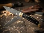 Damascus Folding Pocket Knife — Hand-Forged, Buffalo Horn Handle, Leather Sheath (RK-1065)