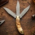 Damascus Folding Pocket Knife — Hand-Forged, Ram Horn Handle, Leather Sheath (RK-1062)