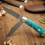 Damascus Folding Pocket Knife — Hand-Forged, Leather Sheath