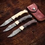 Damascus Folding Pocket Knife — Hand-Forged, Buffalo Horn Handle, Leather Sheath