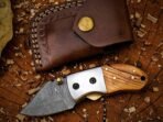 Damascus Folding Pocket Knife, Hand-Forged, Olive Wood Handle, Leather Sheath - view 3