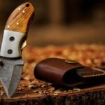 Damascus Folding Pocket Knife — Hand-Forged, Olive Wood Handle, Leather Sheath