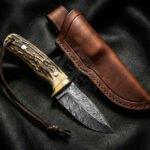 Damascus Skinner Knife — Hand-Forged, Stag Horn Handle, Leather Sheath | Engraving Available