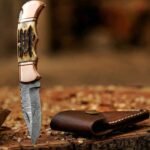 Damascus Folding Pocket Knife — Hand-Forged, Stag Horn Handle, Leather Sheath (RK-1087)