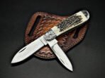 Damascus Folding Pocket Knife — Hand-Forged, Stag Horn Handle, Leather Sheath | Engraving Available