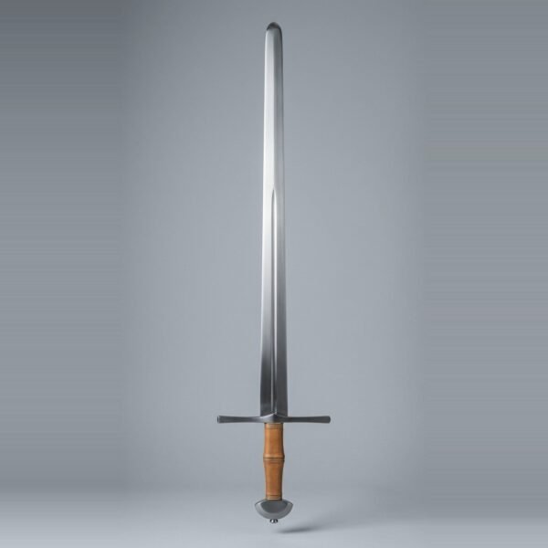 Blunt arming sword trainer with a narrow fullered blade, plain straight cross and demi lune pommel over a tan leather grip with three cord risers against a plain grey studio backdrop