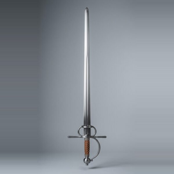 Bolognese sidesword trainer with two finger rings, a knuckle bow and russet leather wrapped grip standing point up against a plain grey studio backdrop