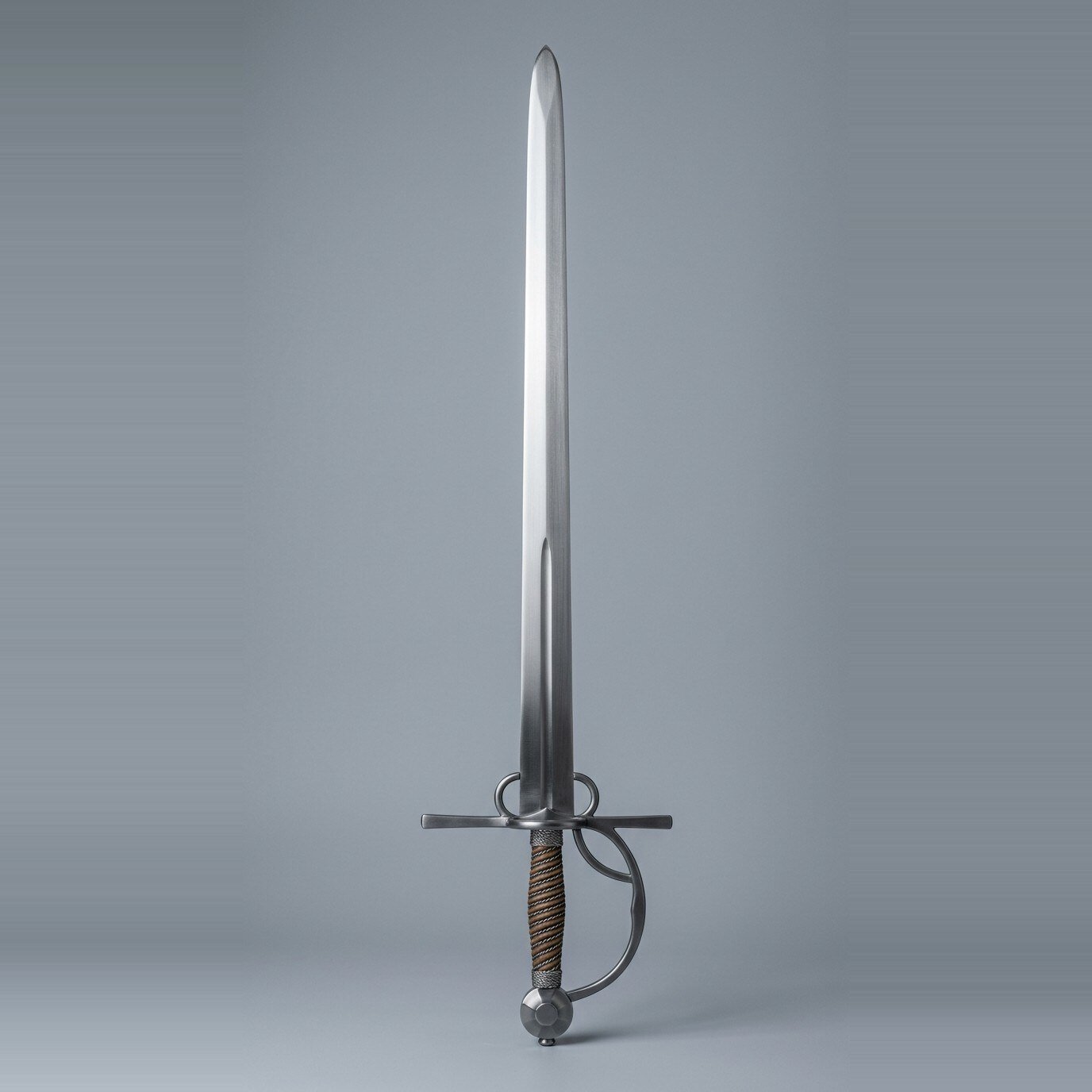Thanmir Ringed Sidesword RK-3018 Cut and thrust sidesword trainer with two side rings, a counterguard loop, two colour wire wound grip and faceted wheel pommel on a plain grey studio backdrop