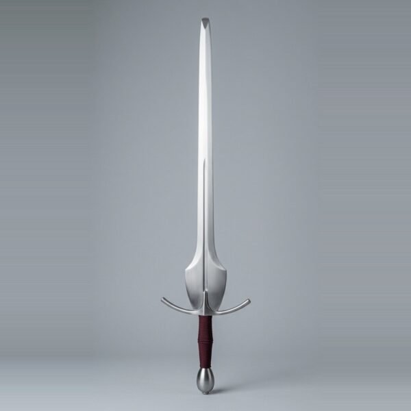 Feder training sword with a shield shaped schilt, curved crossguard, a narrow fuller low in the blade and a burgundy cord wrapped grip standing point up against a plain grey studio backdrop