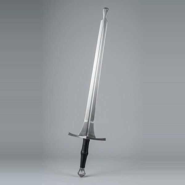 Feder with a flared safety knob tip, triangular schilt, wide straight cross and a black leather two handed grip shown against a plain studio backdrop