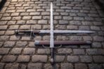 Flame blade undulating evenly from ricasso to rounded point on a two handed sword