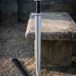 Runemarch Hand Forged Pattern Welded Viking Sword | 36 Inch Overall | Elder Futhark Cut Guard with Lobed Pommel and Black Leather Scabbard | Norse Collector Gift | RK-1652