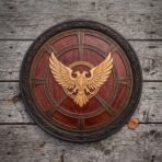 Hand made carved hardwood double headed eagle shield in deep red brown with a pale gold twin headed eagle carving, blackened steel rim and knotwork band on weathered planks