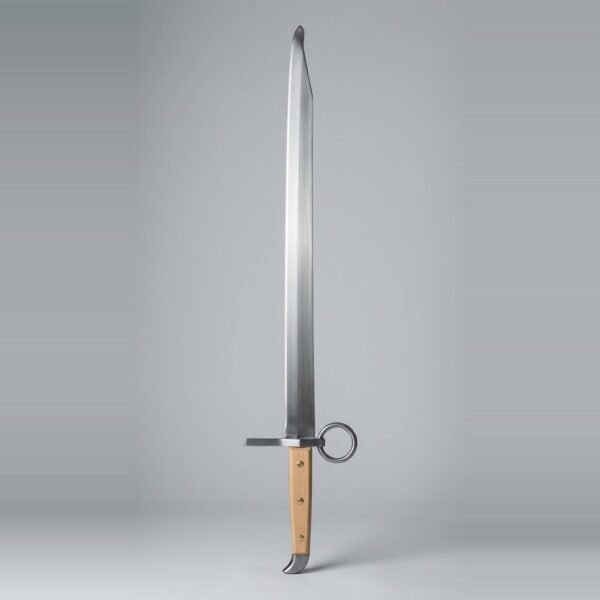 Langes messer trainer with a single edged blunt blade, ring nagel on the flat, three brass rivets through pale wood scales and a beak shaped butt cap on a plain studio backdrop